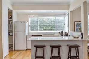 Oven, dishwasher, coffee/tea maker, cookware/dishes/utensils