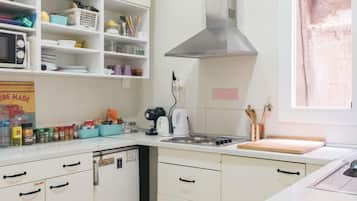 1 bed in 4-Bed Mixed Dormitory Room | Shared kitchen | Fridge, microwave, stovetop, rice cooker