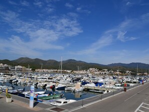 Stroll along the marina's paved walkway and enjoy the views of the surrounding residential area and hills.