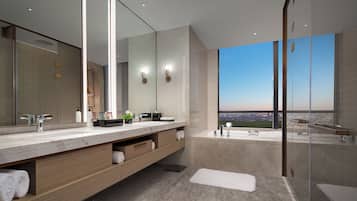 Executive Suite | Bathroom | Separate tub and shower, deep soaking tub, rainfall showerhead