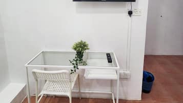 Standard Triple Room | Blackout drapes, iron/ironing board, free WiFi, bed sheets