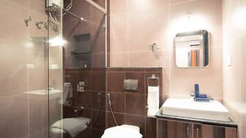 Standard Double Room, 1 King Bed | Bathroom | Shower, slippers, towels