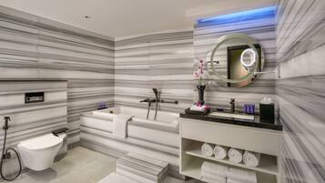 Deluxe Suite | Bathroom | Rainfall showerhead, hair dryer, bathrobes, slippers
