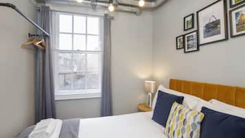 2 habitaciones, tabla de planchar con plancha, wifi y ropa de cama