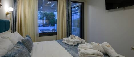 1 dormitori, planxa i posts de planxar, un bressol de viatge i wifi