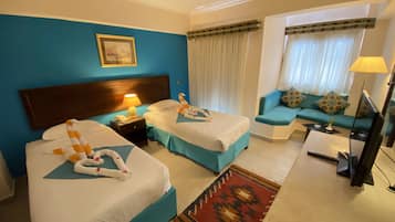 Coffres-forts dans les chambres, draps fournis