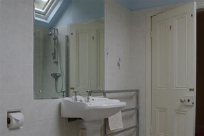 Bathtub, hair dryer, towels