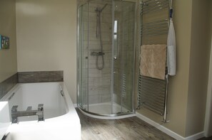 Bathtub, hair dryer, towels