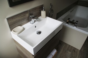Bathtub, hair dryer, towels