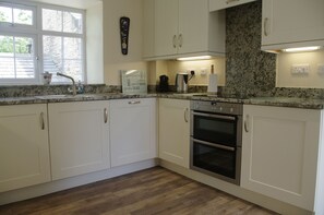 Fridge, microwave, oven, stovetop - Country Hideaways | Hazeley Cottage | West Burton (Leyburn)