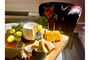 Welcome cheese board and wine setup - BygoneEraBoutiqueCondotel/Beach/Dine/Paradise (Palm Beach)