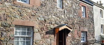 Full of character, this cosy cottage is in a quiet lane in a charming village.