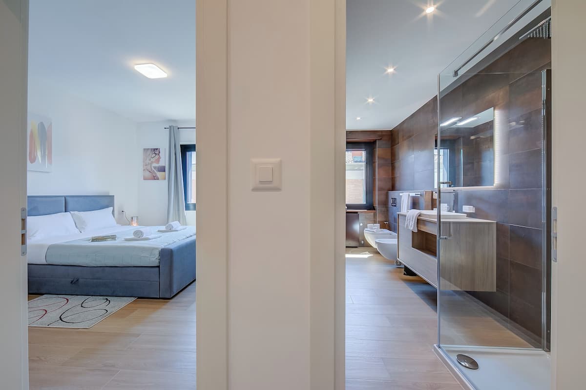Family Apartment, 2 Bedrooms, 2 Bathrooms (Boutique Apartment 7) | 1 bedroom, laptop workspace, iron/ironing board, free WiFi