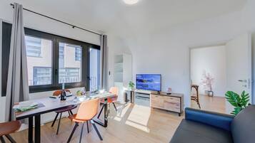 Family Apartment, 1 Bedroom (Boutique Apartment 12) | Living area | 21-inch TV with digital channels