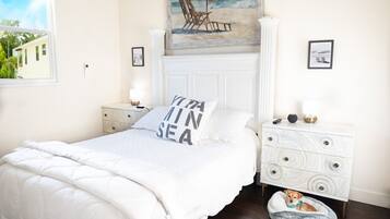 1 bedroom, desk, iron/ironing board, travel crib