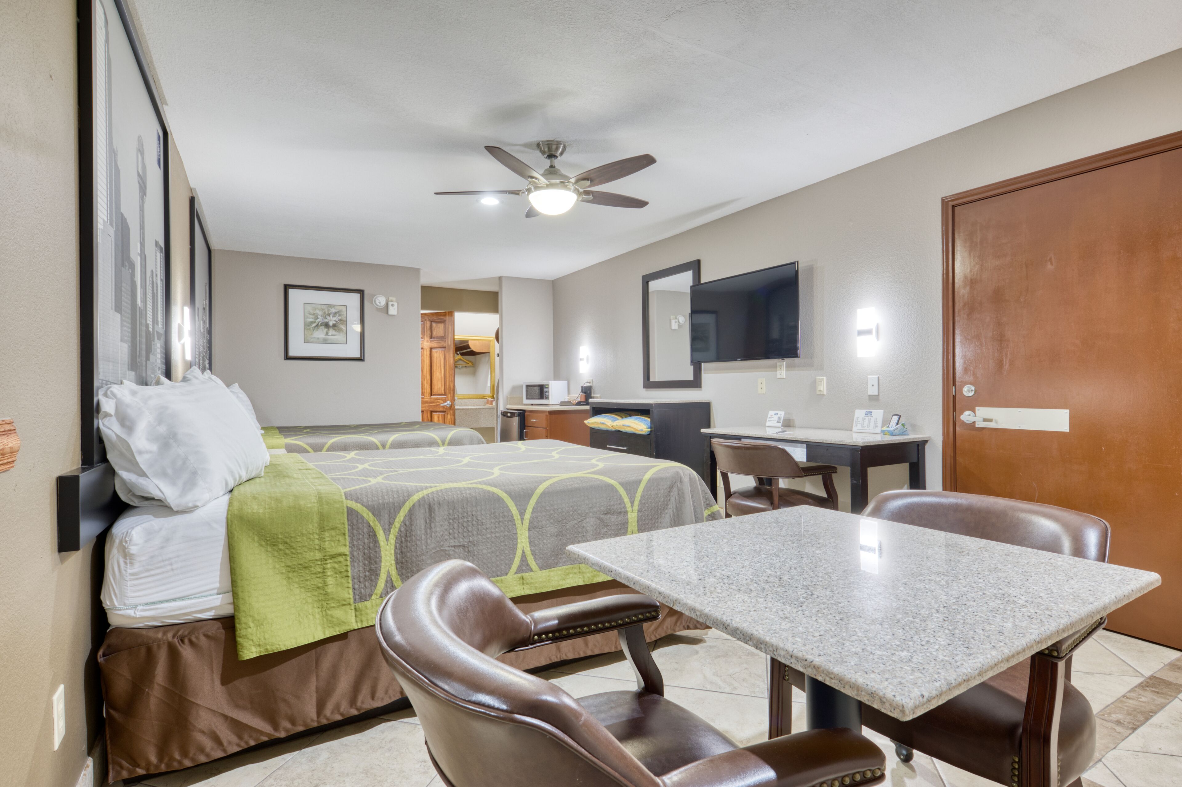 Premium bedding, desk, laptop workspace, free WiFi