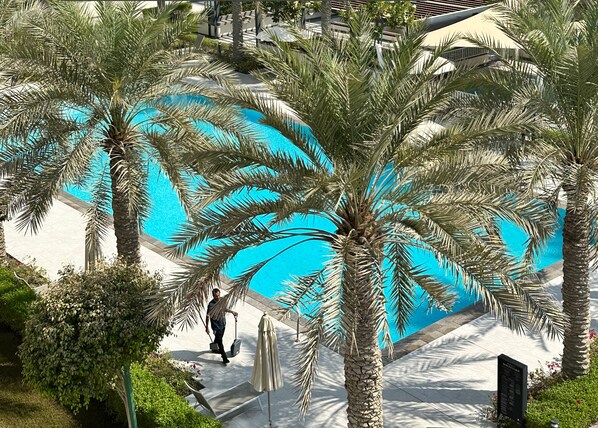 Outdoor pool - Waterfront and Sunset Facing Smart Apartment (Muḥāfaẓat al-Muḥarraq)