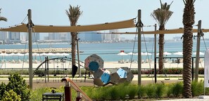 Beach - Waterfront and Sunset Facing Smart Apartment (Muḥāfaẓat al-Muḥarraq)