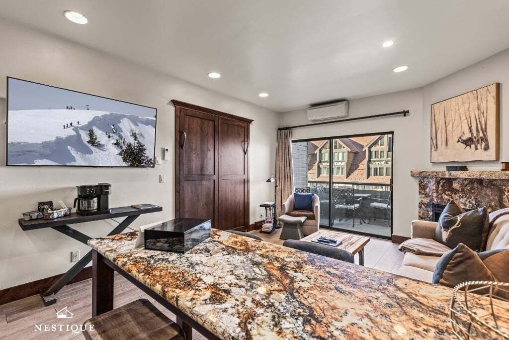 TV, fireplace, books