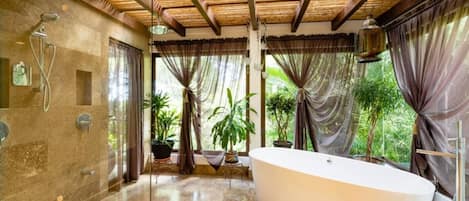 Bathtub, hair dryer, towels