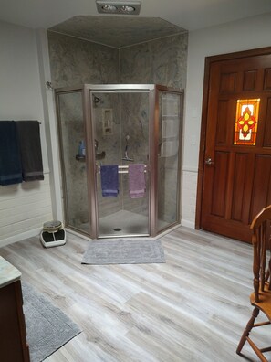 Shower, hair dryer, towels, soap