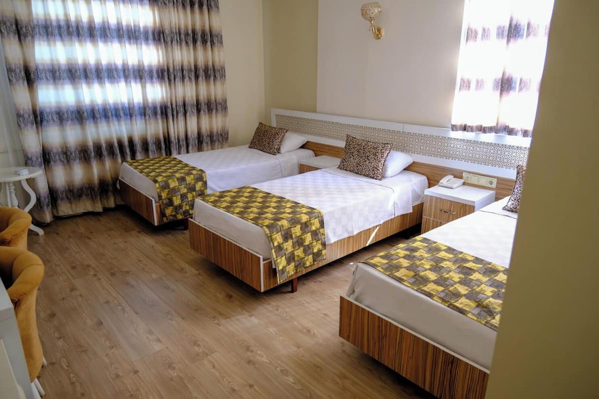 Standard Triple Room | Minibar, in-room safe, desk, laptop workspace