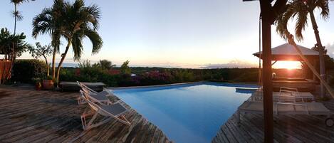Outdoor pool, pool umbrellas, pool loungers