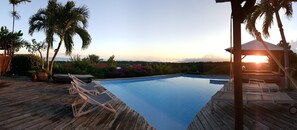 Outdoor pool, pool umbrellas, sun loungers