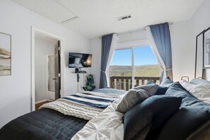 2 bedrooms, desk, iron/ironing board, travel crib