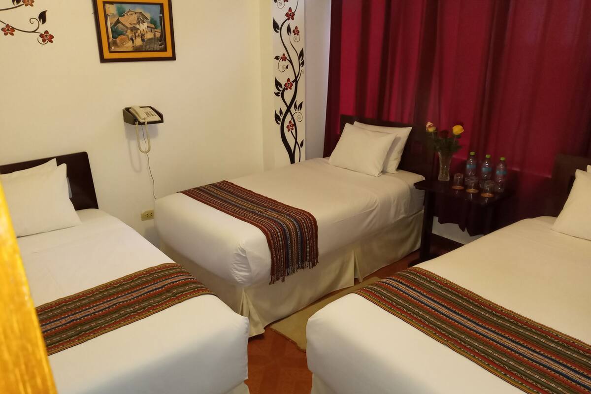 Basic Triple Room | Laptop workspace, WiFi (free), individually decorated