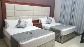 Habitación ejecutiva doble | Sábanas de algodón egipcio y ropa de cama de alta calidad