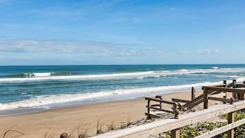 On the beach, sun-loungers, beach towels