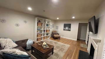 Smart TV, fireplace, books