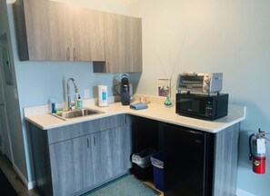 Fridge, microwave, coffee/tea maker, toaster