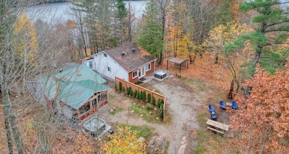 Rarely offered 2 waterfront cottages with 2 hot tubs side by side!