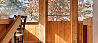 Rarely offered 2 waterfront cottages with 2 hot tubs side by side!