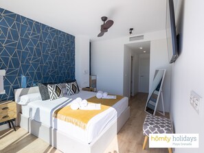 2 slaapkamers, een strijkplank/strijkijzer, reisbedje, gratis wifi