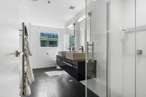 Bathtub, hair dryer, towels
