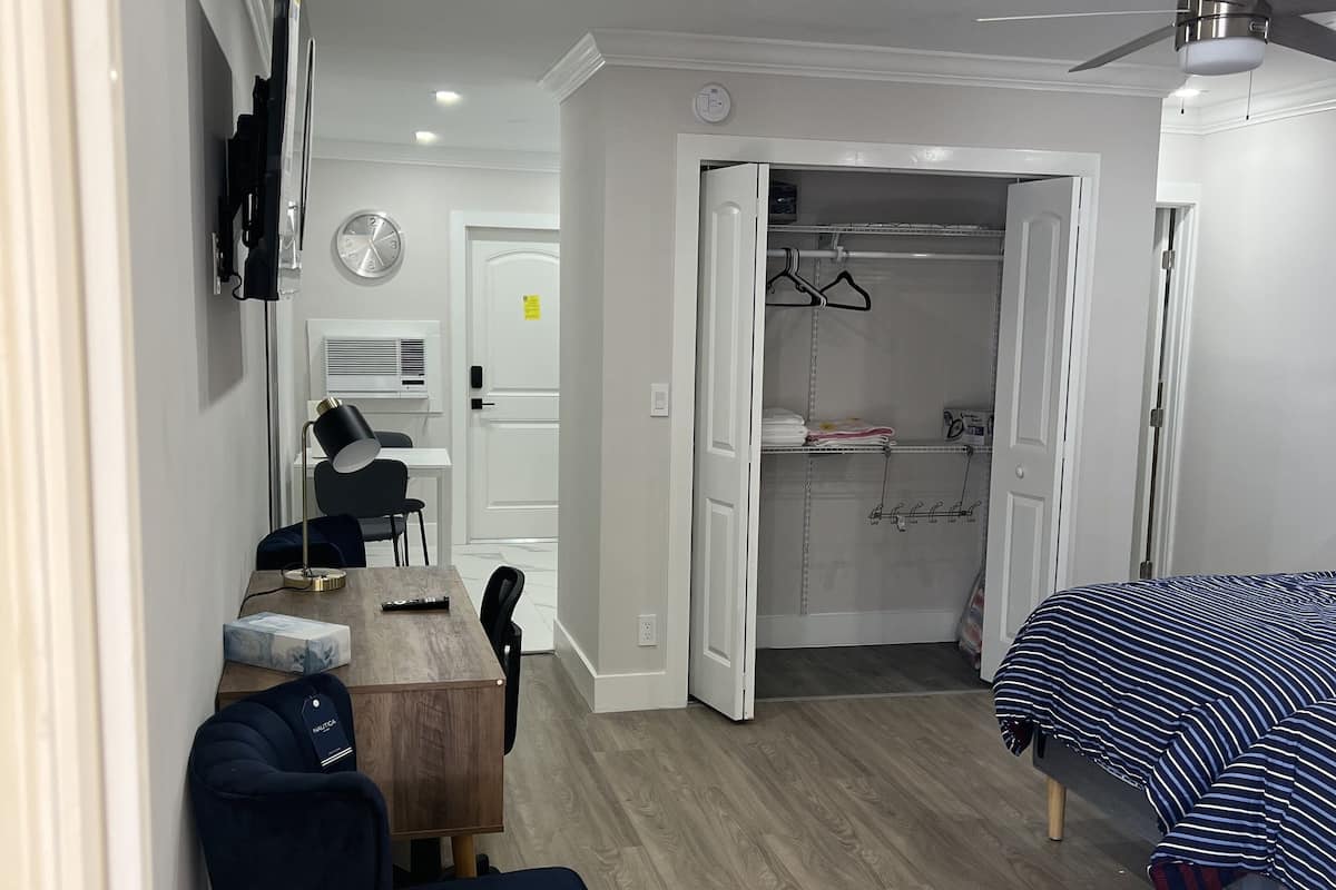 Suíte estúdio com design assinado | 2 quartos, roupas de cama premium, edredons de pluma