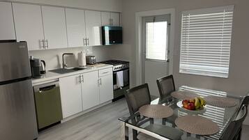 Superior Apartment | Private kitchen | Full-size fridge, microwave, oven, stovetop