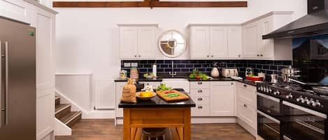 Fridge, dishwasher, cookware/dishes/utensils