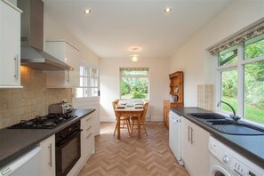 Fridge, dishwasher, cookware/dishes/utensils