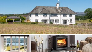 A white building with a large window and a fireplace. - Hawkrigg Farm (Ambleside)