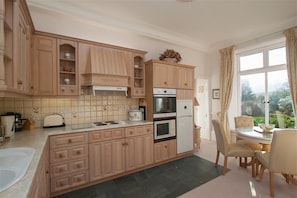 Fridge, dishwasher, cookware/dishes/utensils