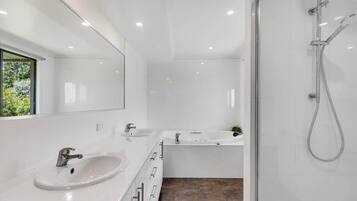 Bathtub, towels, shampoo