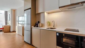 Standard Double Room | Private kitchen | Fridge, microwave