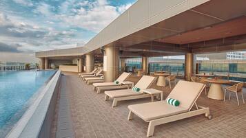 Outdoor pool, open 6:00 AM to 9:00 PM, sun loungers