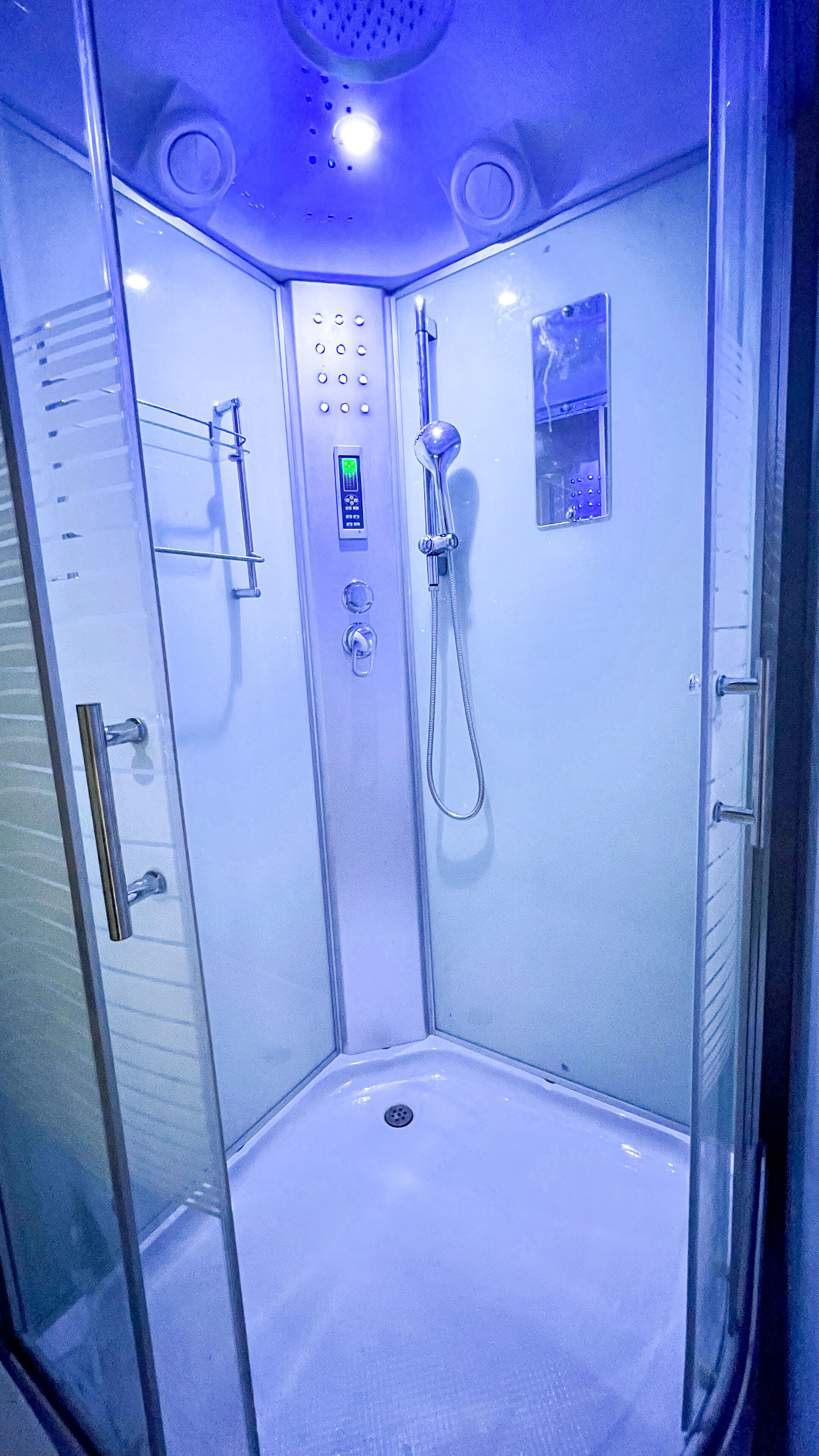 Shower, towels, soap, toilet paper