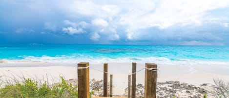 On the beach, sun-loungers, beach towels