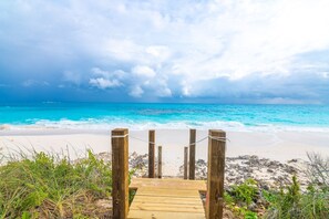 On the beach, sun loungers, beach towels